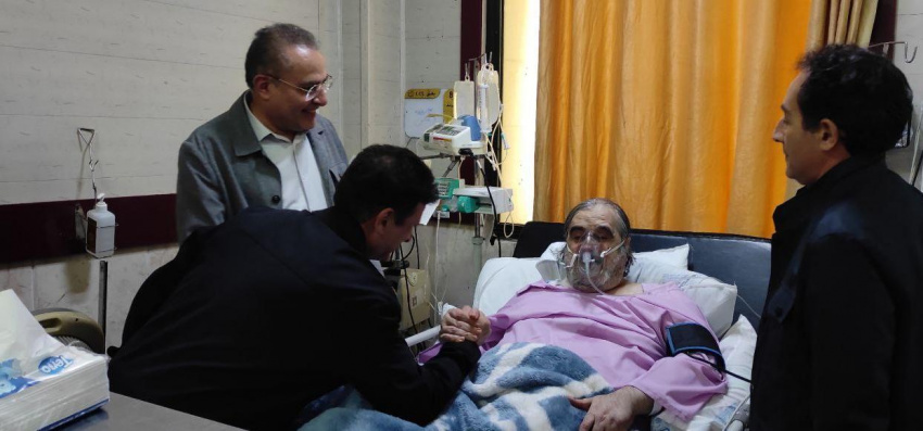 عیادت دکتر بهزاد داورنیا، رئیس دانشگاه از حاج جواد دانش‌پرور، رزمنده و جانباز هشت سال دفاع مقدس